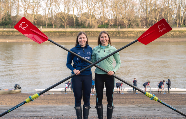 Catherine and Gemma King (twins) with oars by river.