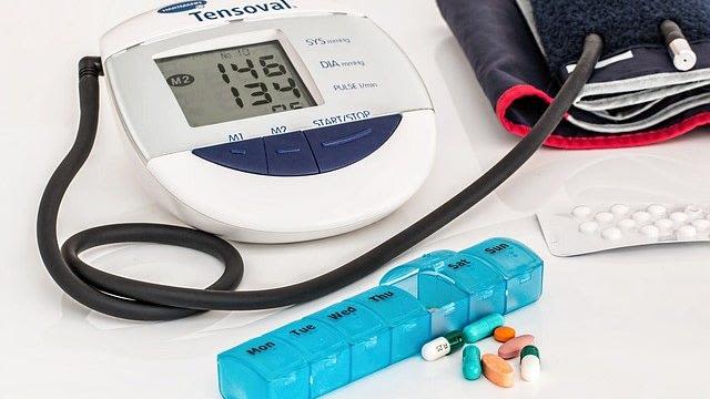 Photo of blood pressure monitor and medication